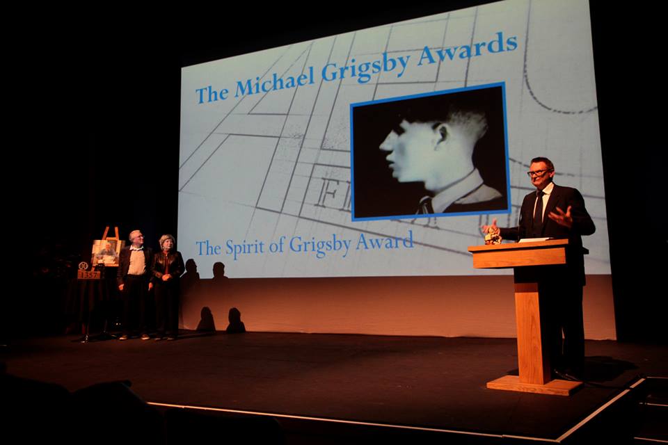 From left to right: Chris and Marion Grigsby prepare to present the first Michael Grigsby Awards as AFU director Jeremy Taylor announces the winners